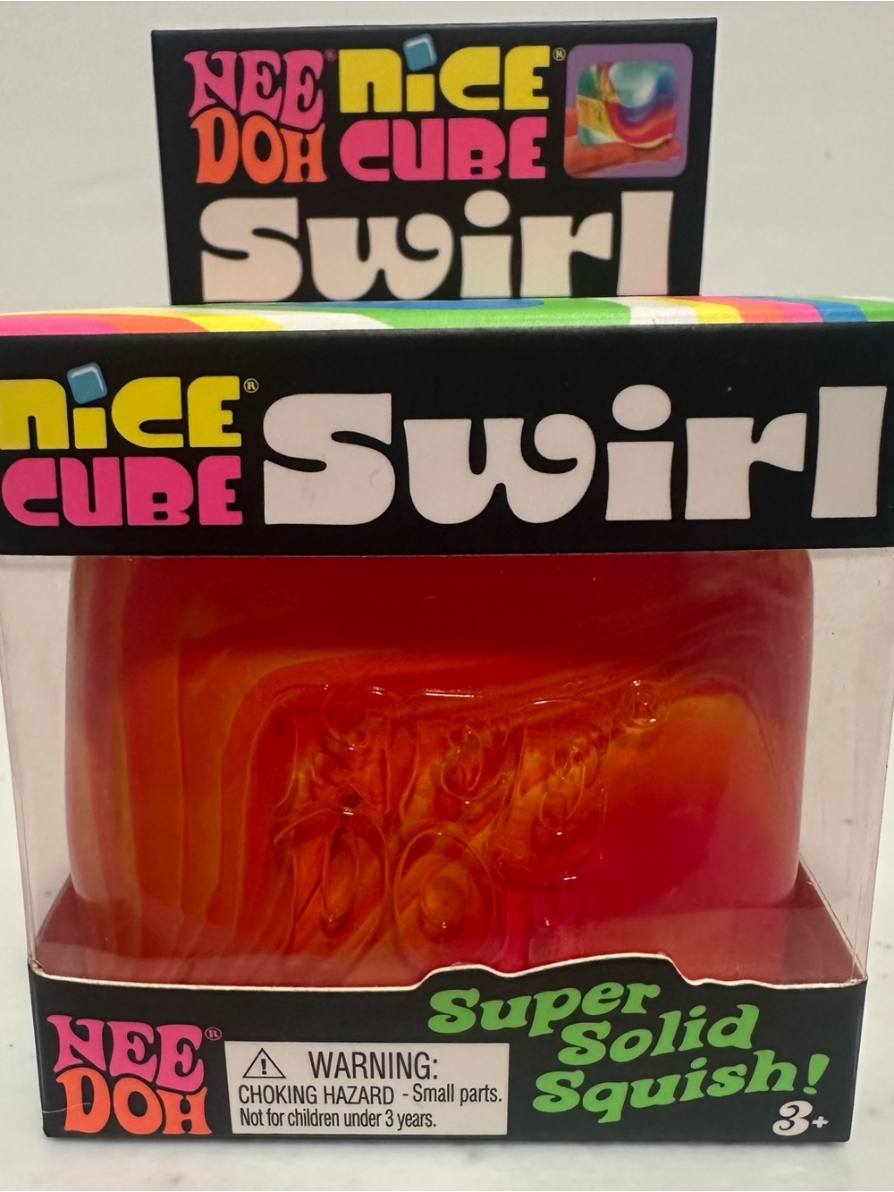NeeDoh Swirl Super Solid Squish Cube - Yellow and Orange